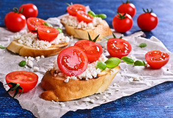 Sandwich with cheese, tomato and Basil