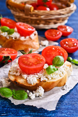 Sandwich with cheese, tomato and Basil