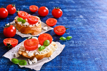 Sandwich with cheese, tomato and Basil