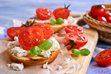 Sandwich with cheese, tomato and Basil