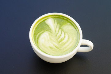 beautiful green tea on black background