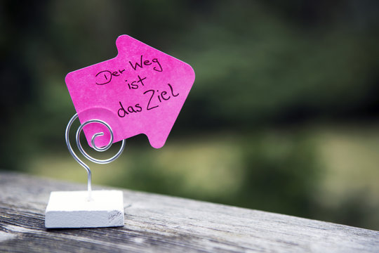 handwritten german quote "Der Weg ist das Ziel" (the journey is
