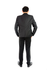 Businessman standing with back isolate