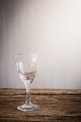 wine glass on wooden tabletop