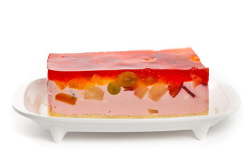 Fruit yogurt cheesecake with jelly on white background