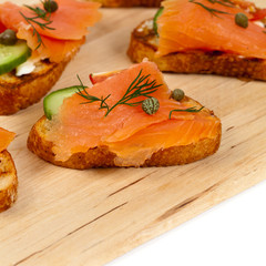 Canape with smoked salmon. Selective focus