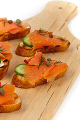 Canape with smoked salmon. Selective focus