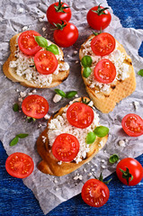 Sandwich with cheese, tomato and Basil