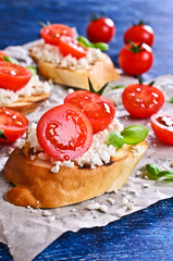Sandwich with cheese, tomato and Basil
