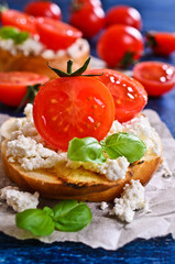 Sandwich with cheese, tomato and Basil