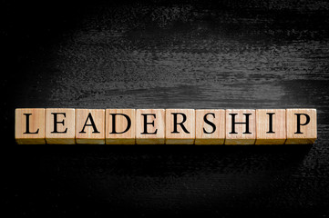 Word LEADERSHIP isolated on black background