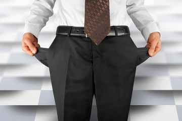 man showing empty pockets