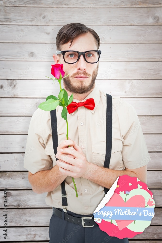 Poster Composite image of geeky hipster offering a rose
