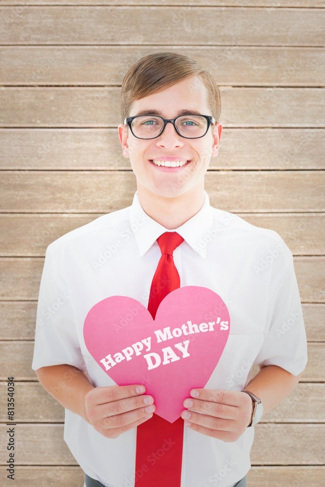 Poster composite image of geeky hipster holding heart card