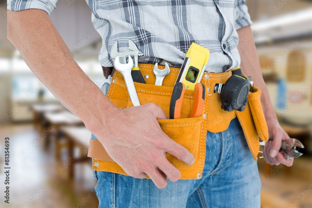 Aufkleber cropped image of technician with tool belt
