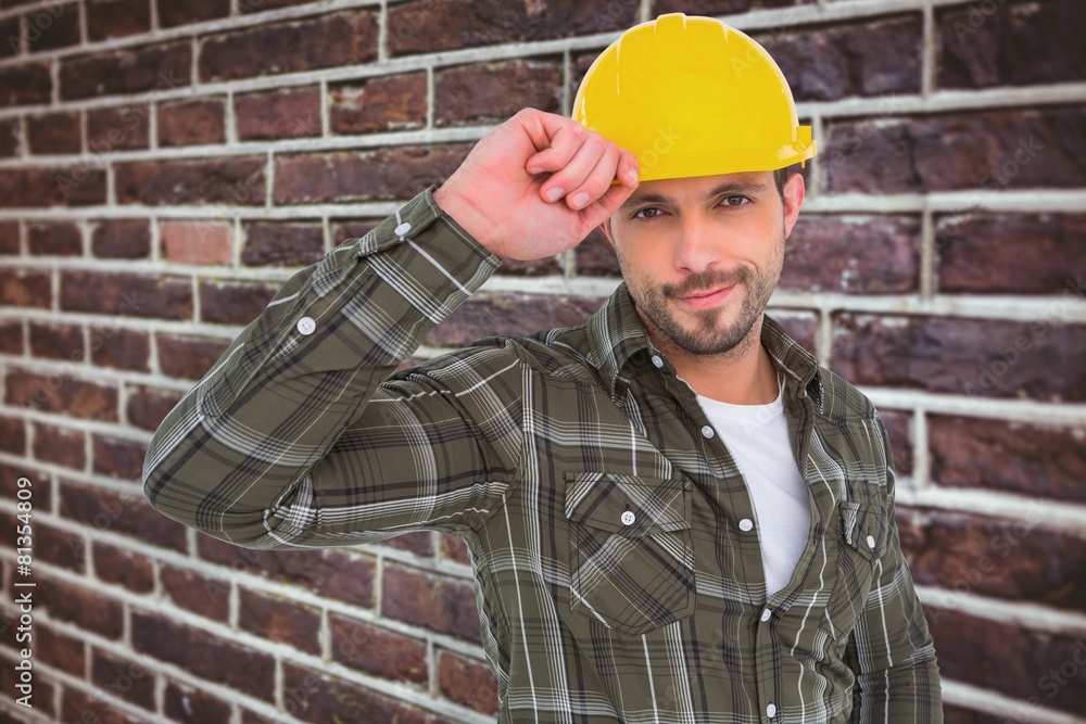 Poster composite image of smiling handyman holding helmet
