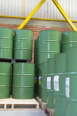 Green metal barrels