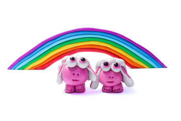 Rainbow and two plasticine sheep.