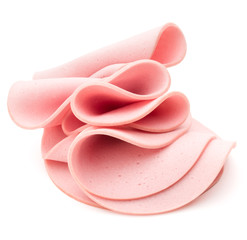 cooked boiled ham sausage or rolled bologna slices isolated on w