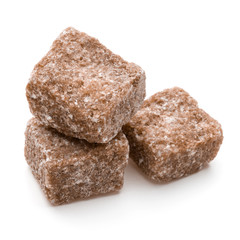 Brown lump cane sugar cube isolated on white background cutout