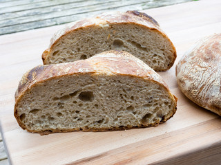 Round french boule bread cut in half