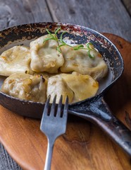 Pierogi (dumplings with sauerkraut and mushrooms)