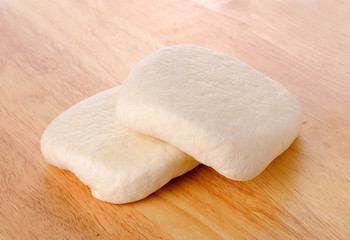 Tofu cubes on wooden