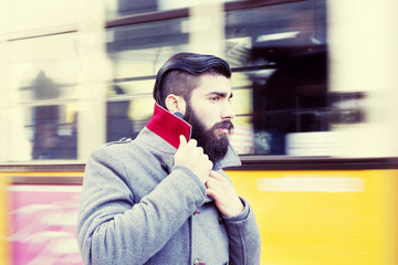 portrait of young hipsters businessman around a modern city