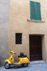 Yellow Vespa scooter