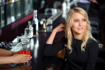 Beautiful woman in the bar