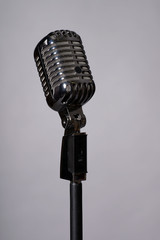 Fototapeta premium Old fashioned microphone with space for text