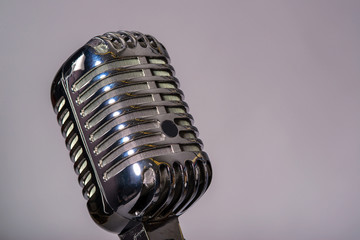 Old fashioned microphone with space for text