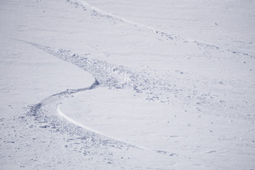 Tracks on a mountain Slope, freeride in deep snow