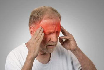 senior man suffering from headache