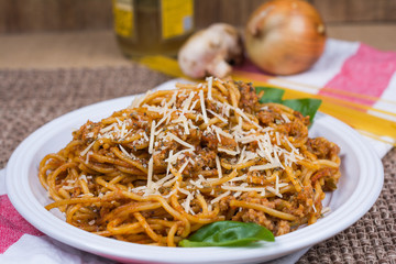 Plate of spaghetti with parmesan onions and mushroom