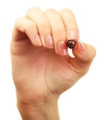 Female hand with marker isolated on white