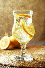 Glass of freshness lemonade, on bright background
