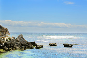 Fototapeta na wymiar View on tropical beach and ocean in sunny day