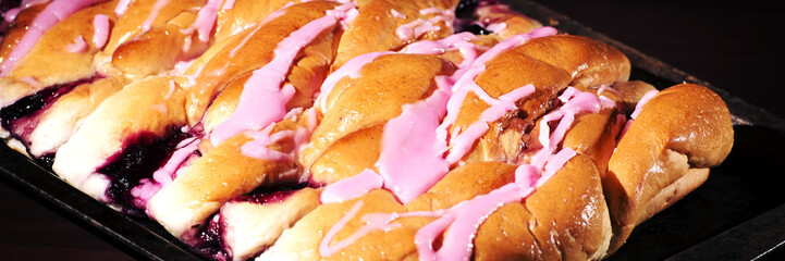 Strawberry danish pastry on a baking tray 