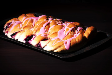 Strawberry danish pastry on a baking tray 