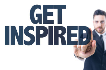 Business man pointing the text: Get Inspired