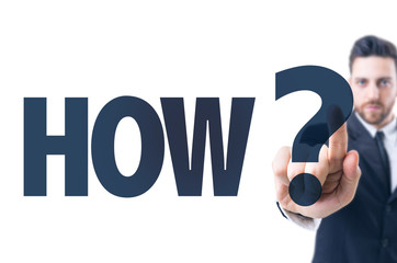 Business man pointing the text: How?