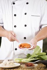 Chef present noodle with noodle ingredient