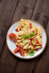 Ravioli stuffed with mozzarella and served with tomato sauce