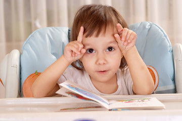  little girl is reading