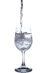Drinking water is poured into a glass