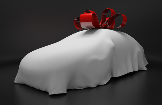 Auto Concept Of A New Covered Sports Car With A Red Gift Ribbon