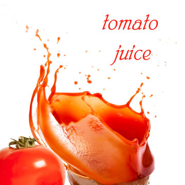 Splashes of tomato juice and tomato on white background