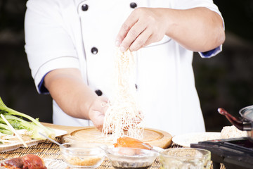 Chef present noodle before cooking