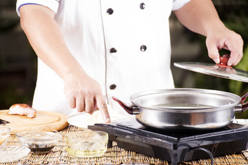 Chef turn on switch magnetic stove before cooking